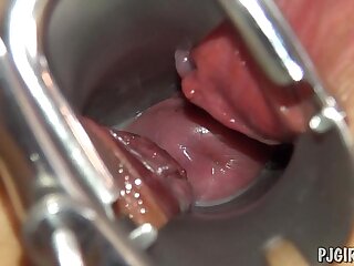 Violeta's climaxes with a speculum in her vagina